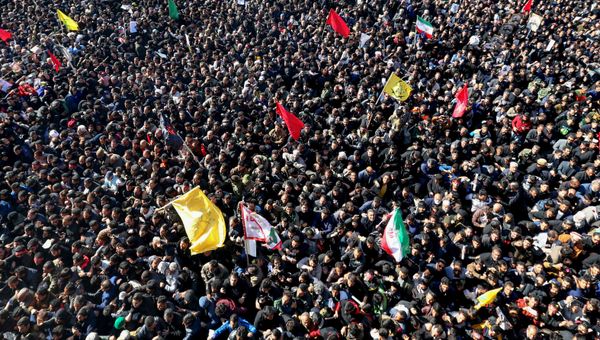 Iranian mourners gather during the final stage of funeral processions for slain top general Qasem Soleimani, in his hometown Kerman on January 7, 2020. Iranian mourners gather during the final stage of funeral processions for slain top general Qasem Soleimani, in his hometown Kerman on January 7, 2020. - Sputnik International