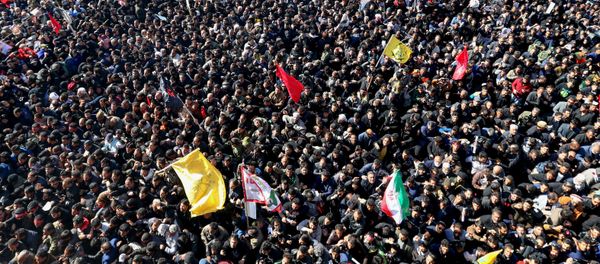 Iranian mourners gather during the final stage of funeral processions for slain top general Qasem Soleimani, in his hometown Kerman on January 7, 2020. Iranian mourners gather during the final stage of funeral processions for slain top general Qasem Soleimani, in his hometown Kerman on January 7, 2020. - Sputnik International