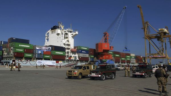 A loaded Chinese ship is readied for departure during a ceremony at Gwadar port, about 435 miles, 700 km, west of Karachi. Pakistan, Sunday, Nov. 13, 2016 - Sputnik International