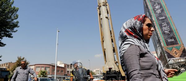 A Shahab-3 surface-to-surface missile is pictured on display in a street exhibition by Iran's army and paramilitary Revolutionary Guard celebrating Defence Week marking the 39th anniversary of the start of 1980-88 Iran-Iraq war, at the Baharestan Square in Tehran, on September 26 2019 A Shahab-3 surface-to-surface missile is pictured on display in a street exhibition by Iran's army and paramilitary Revolutionary Guard celebrating Defence Week marking the 39th anniversary of the start of 1980-88 Iran-Iraq war, at the Baharestan Square in Tehran, on September 26 2019 - Sputnik International
