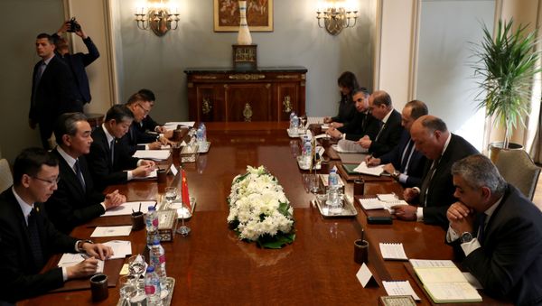 Chinese foreign minister Wang Yi meets with his Egyptian counterpart Sameh Shoukry in Cairo, Egypt January 8, 2020 - Sputnik International