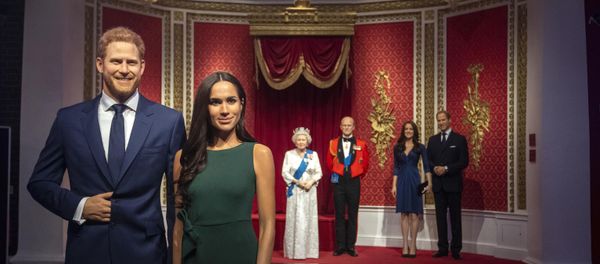The figures of Britain's Prince Harry and Meghan, Duchess of Sussex, left, are moved from their original positions next to Queen Elizabeth II, Prince Philip and Prince William and Kate, Duchess of Cambridge, at Madame Tussauds in London, Thursday Jan. 9, 2020. Madame Tussauds moved its figures of Prince Harry and Meghan, Duchess of Sussex from its Royal Family set to elsewhere in the attraction. The figures of Britain's Prince Harry and Meghan, Duchess of Sussex, left, are moved from their original positions next to Queen Elizabeth II, Prince Philip and Prince William and Kate, Duchess of Cambridge, at Madame Tussauds in London, Thursday Jan. 9, 2020. Madame Tussauds moved its figures of Prince Harry and Meghan, Duchess of Sussex from its Royal Family set to elsewhere in the attraction. - Sputnik International
