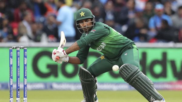 Pakistan's captain Sarfaraz Ahmed bats during the Cricket World Cup match between India and Pakistan at Old Trafford in Manchester, England, Sunday, June 16, 2019 - Sputnik International