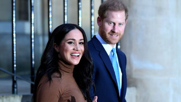  Britain's Prince Harry and his wife Meghan, Duchess of Sussex react as they leave after their visit to Canada House in London, Britain  January 7, 2020 - Sputnik International