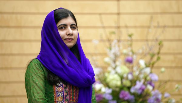 Nobel Peace Prize laureate Malala Yousafzai looks on before her meeting with Japanese Prime Minister Shinzo Abe at Abe's official residence in Tokyo, Friday, March 22, 2019 Nobel Peace Prize laureate Malala Yousafzai looks on before her meeting with Japanese Prime Minister Shinzo Abe at Abe's official residence in Tokyo, Friday, March 22, 2019 - Sputnik International