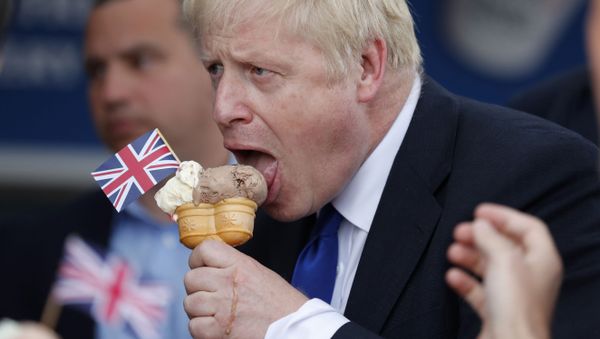 Conservative Party leadership candidate Boris Johnson eats an ice cream in Barry Island, Wales, Saturday, July 6, 2019 ahead of the Conservative party leadership hustings in Cardiff Conservative Party leadership candidate Boris Johnson eats an ice cream in Barry Island, Wales, Saturday, July 6, 2019 ahead of the Conservative party leadership hustings in Cardiff - Sputnik International