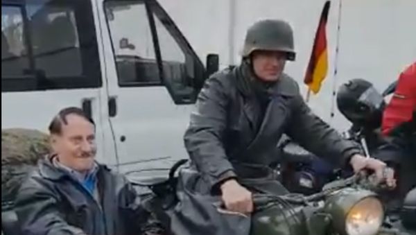 A Hitler look-alike is filmed sitting in a motorcycle sidecar in a video posted to Twitter on Monday, 13 January - Sputnik International