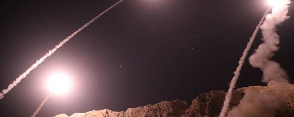 In this photo released on Monday, Oct. 1, 2018, by the Iranian Revolutionary Guard, missiles are fired from city of Kermanshah in western Iran targeting the Islamic State group in Syria. - Sputnik International