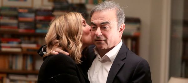 Former Nissan chairman Carlos Ghosn and his wife Carole Ghosn pose for a picture after an exclusive interview with Reuters in Beirut, Lebanon January 14, 2020 - Sputnik International