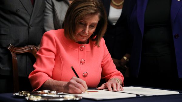 U.S. House Speaker Nancy Pelosi (D-CA) signs the two articles of impeachment of U.S. President Donald Trump before sending them over to the U.S. Senate during an engrossment ceremony at the U.S. Capitol in Washington, U.S., January 15, 2020 - Sputnik International