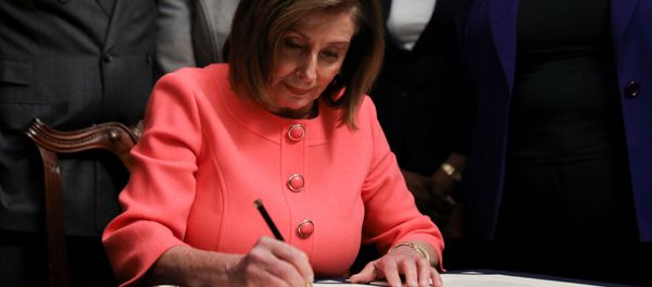 U.S. House Speaker Nancy Pelosi (D-CA) signs the two articles of impeachment of U.S. President Donald Trump before sending them over to the U.S. Senate during an engrossment ceremony at the U.S. Capitol in Washington, U.S., January 15, 2020 U.S. House Speaker Nancy Pelosi (D-CA) signs the two articles of impeachment of U.S. President Donald Trump before sending them over to the U.S. Senate during an engrossment ceremony at the U.S. Capitol in Washington, U.S., January 15, 2020 - Sputnik International