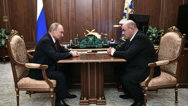 Russian President Vladimir Putin and Head of the Federal Tax Service Mikhail Mishustin, nominated on the post of the prime minister - Sputnik International
