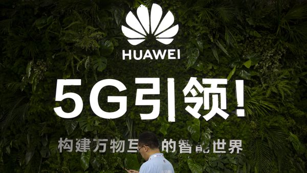 Chinese technology firm Huawei at the PT Expo in Beijing Chinese technology firm Huawei at the PT Expo in Beijing - Sputnik International