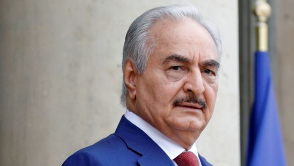 FILE PHOTO: Khalifa Haftar, the military commander who dominates eastern Libya, arrives to attend an international conference on Libya at the Elysee Palace in Paris, France, May 29, 2018 FILE PHOTO: Khalifa Haftar, the military commander who dominates eastern Libya, arrives to attend an international conference on Libya at the Elysee Palace in Paris, France, May 29, 2018 - Sputnik International