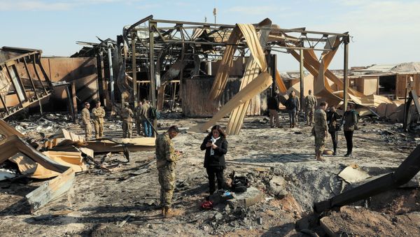 Media outlets visit one of the many impact sites created by the recent missile attacks at Al Asad Air Base, Iraq, Jan. 13, 202 - Sputnik International