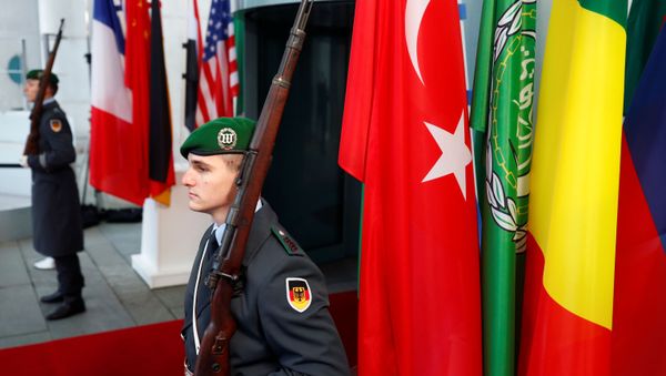 German soldiers stand guard at the Chancellery before the Libya summit in Berlin, Germany, January 19, 2020.  REUTERS/Hannibal Hanschke - Sputnik International