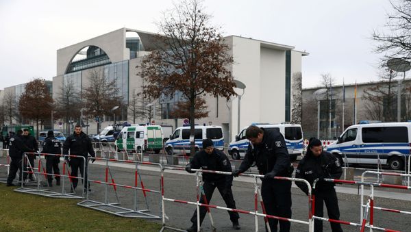 German police officers prepare for a protest against Turkish President Tayyip Erdogan participating in the Libya summit in Berlin, Germany, January 19, 2020.  REUTERS/Christian Mang - Sputnik International