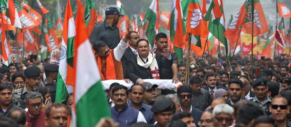Jagat Prakash Nadda, Working President of India's ruling Bharatiya Janata Party (BJP), waves as he attends a march in support of a new citizenship law, in Kolkata, India, 23 December 2019 - Sputnik International
