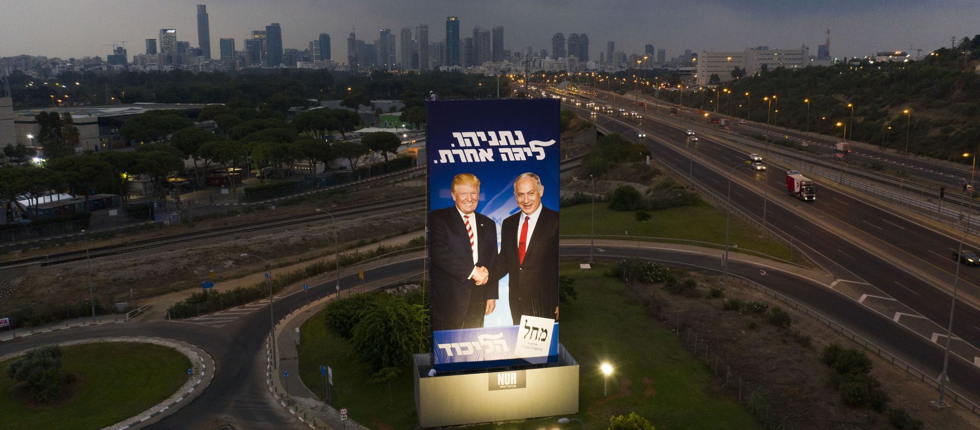 A massive Likud party election campaign billboard shows Israeli Prime Minister Benjamin Netanyahu, right, and US President Donald Trump in Tel Aviv, Israel, Sunday, 8 September 2019. The Hebrew on the billboard reads Netanyahu, in another league. A massive Likud party election campaign billboard shows Israeli Prime Minister Benjamin Netanyahu, right, and US President Donald Trump in Tel Aviv, Israel, Sunday, 8 September 2019. The Hebrew on the billboard reads Netanyahu, in another league. - Sputnik International, 1920, 21.01.2020