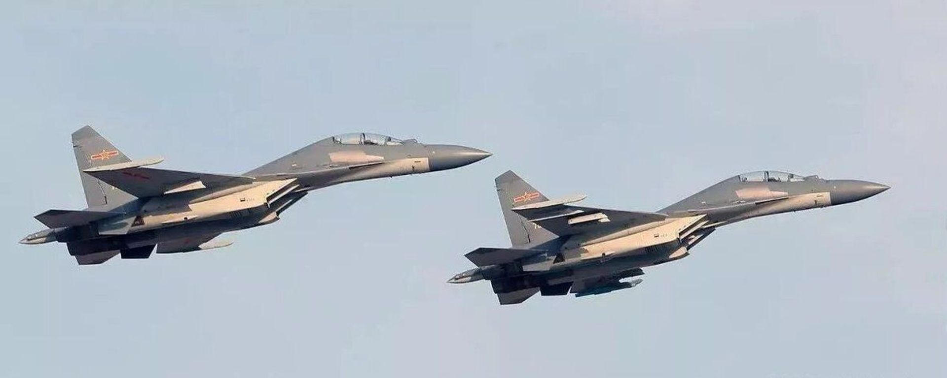 Two Chengdu J-16 Fighters of China's People's Liberation Army Air Force (PLAAF) Two Chengdu J-16 Fighters of China's People's Liberation Army Air Force (PLAAF) - Sputnik International, 1920, 20.01.2023