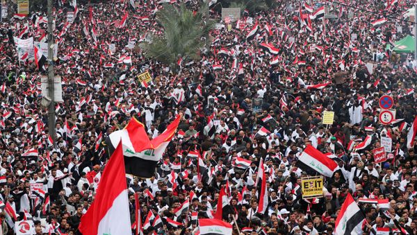 Supporters of Iraqi Shi'ite cleric Moqtada al-Sadr protest against what they say is U.S. presence and violations in Iraq, during a demonstration in Baghdad - Sputnik International