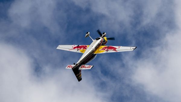 German pilot Matthias Dolderer flips his plane in the air during Red Bull Race Day at Grenchen Airport, Switzerland on August 10, 2019 // Jaanus Ree / Red Bull Content Pool - Sputnik International