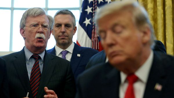 U.S. President Donald Trump listens as his national security adviser John Bolton speaks - Sputnik International
