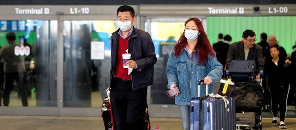 Passengers leave LAX after arriving from Shanghai, China Passengers leave LAX after arriving from Shanghai, China - Sputnik International