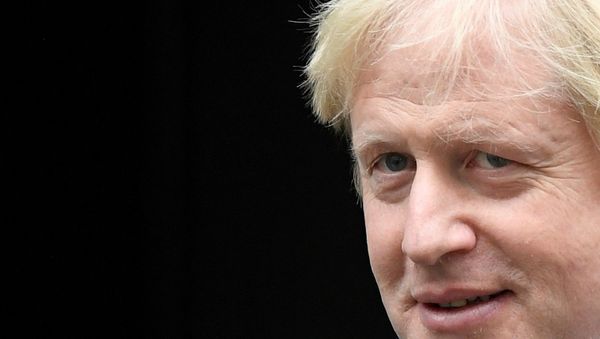FILE PHOTO: Britain's Prime Minister Boris Johnson leaves Downing Street in London, Britain, January 22, 2020. REUTERS/Toby Melville/File Photo - Sputnik International