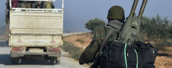 Soldiers of Syrian army are seen after the liberation of Jaranjaz town from militants, northwestern province of Idlib, Syria. Due to the location of Jarjanaz, this will enable the army to take control over the important Hama-Aleppo road in Idlib, which remains a terrorist stronghold. - Sputnik International