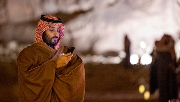 Saudi Arabia's Crown Prince Mohammed bin Salman uses his phone during a meeting with Japan's Prime Minister Shinzo Abe in Riyadh Saudi Arabia's Crown Prince Mohammed bin Salman uses his phone during a meeting with Japan's Prime Minister Shinzo Abe in Riyadh - Sputnik International