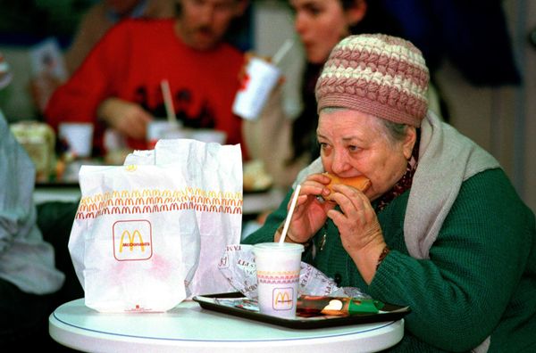 An elderly Soviet woman, or babushka, eats a McDonald's hamburger in Moscow, 31 January 1990. Hundreds of people crowded around the first McDonald's on its opening day, 14 years after McDonald's Canada first suggested selling hamburgers in the Soviet Union. An elderly Soviet woman, or babushka, eats a McDonald's hamburger in Moscow, 31 January 1990. Hundreds of people crowded around the first McDonald's on its opening day, 14 years after McDonald's Canada first suggested selling hamburgers in the Soviet Union. - Sputnik International