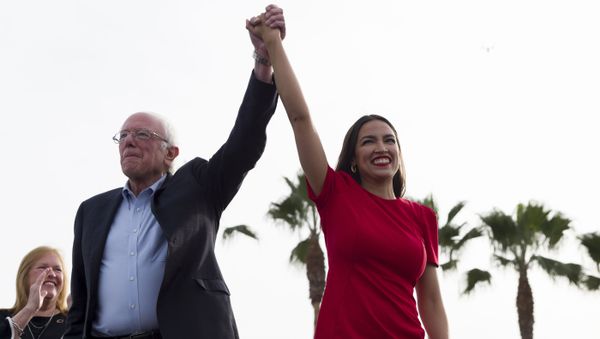 Democratic presidential candidate Sen. Bernie Sanders, I-Vt., and Rep. Alexandria Ocasio-Cortez, D-N.Y. - Sputnik International