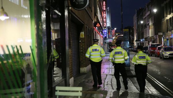 Police officers work in the Soho area of central London on February 3, 2020 after parts of the neighbourhood were evacuated Police officers work in the Soho area of central London on February 3, 2020 after parts of the neighbourhood were evacuated - Sputnik International
