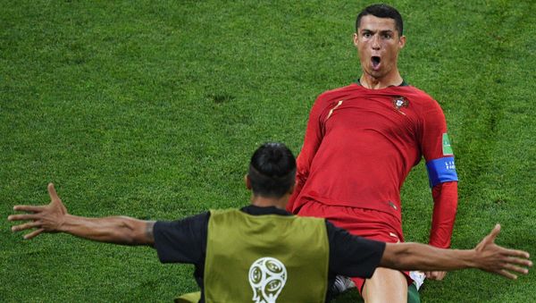 Portugal's Cristiano Ronaldo celebrates the goal during the World Cup Group B soccer match between Portugal and Spain at the Fisht stadium in Sochi, Russia, June 15, 2018. Portugal's Cristiano Ronaldo celebrates the goal during the World Cup Group B soccer match between Portugal and Spain at the Fisht stadium in Sochi, Russia, June 15, 2018. - Sputnik International