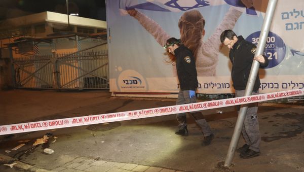 Israeli police officers inspect the scene of an attack in Jerusalem, early Thursday, Feb. 6, 2020 Israeli police officers inspect the scene of an attack in Jerusalem, early Thursday, Feb. 6, 2020 - Sputnik International