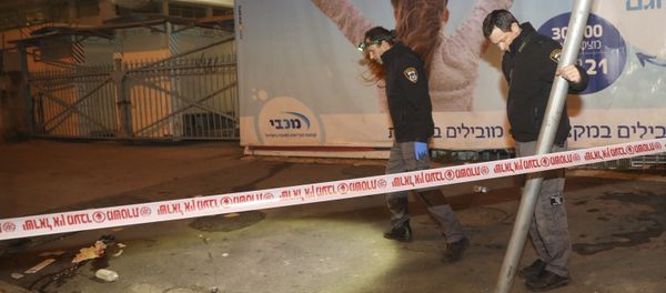 Israeli police officers inspect the scene of an attack in Jerusalem, early Thursday, Feb. 6, 2020 Israeli police officers inspect the scene of an attack in Jerusalem, early Thursday, Feb. 6, 2020 - Sputnik International