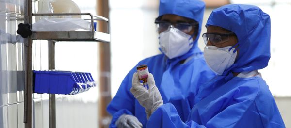 Medical staff with protective clothing are seen inside a ward specialised in receiving any person who may have been infected with coronavirus, at the Rajiv Ghandhi Government General hospital in Chennai, India, January 29, 2020.  - Sputnik International