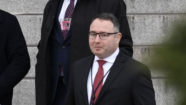 Army Lieutenant Colonel Alexander Vindman, a military officer at the National Security Council who testified during the impeachment hearings on Capitol Hill, walks down the steps of the Eisenhower Executive Office Building on the White House complex in Washington, Monday, Jan. 27, 2020 - Sputnik International