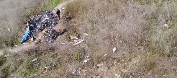 The site of the helicopter crash that killed Kobe Bryant and eight others is seen in a screen grab from drone footage taken in Calabasas, California, U.S. January 27, 2020 and released by the National Transportation Safety Board - Sputnik International
