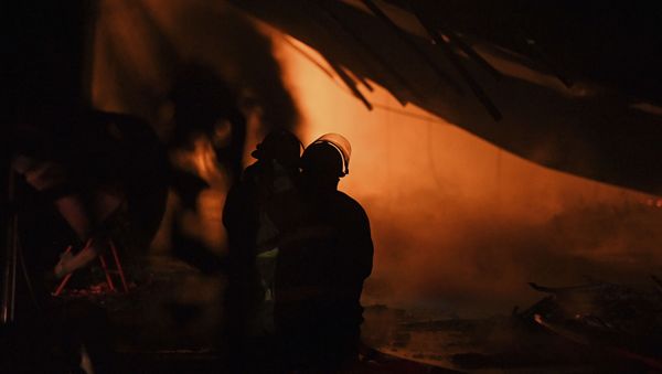 Firefighters Work in Ecru, Mississipi - Sputnik International