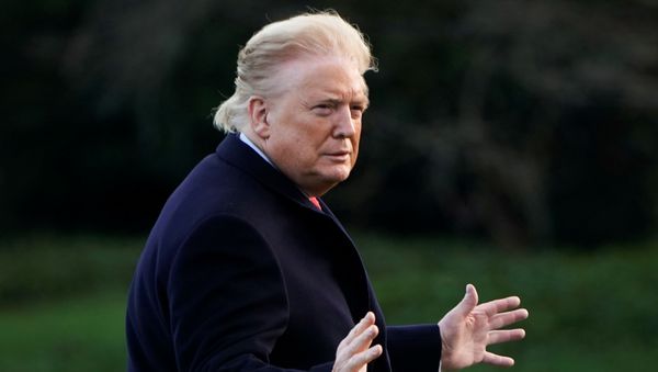 U.S. President Donald Trump walks across the South Lawn to the Oval Office as he returns from a day trip from North Carolina at the White House in Washington, U.S., February 7, 2020. - Sputnik International