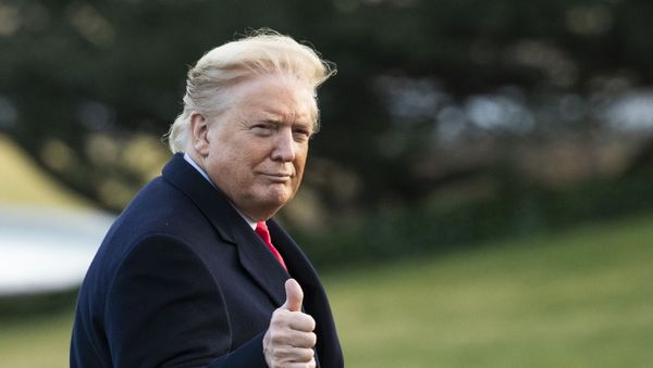 President Donald Trump gestures as he arrives back to the White House, Friday, Feb. 7, 2020, in Washington, from a trip in Charlotte, N.C.  - Sputnik International