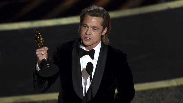 Brad Pitt accepts the award for best performance by an actor in a supporting role for Once Upon a Time in Hollywood at the Oscars on Sunday, Feb. 9, 2020, at the Dolby Theatre in Los Angeles. - Sputnik International
