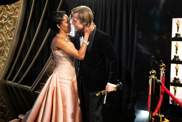 Best Supporting Actor Brad Pitt embraces Regina King as he holds his Oscar at the 92nd Academy Awards in Hollywood, Los Angeles, California on 9 February 2020.  - Sputnik International