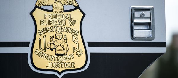 A seal on a door to a Federal Bureau of Investigation mobile command vehicle is seen during an FBI field training exercise at the Landmark Mall May 2, 2014 in Alexandria, Virginia. A seal on a door to a Federal Bureau of Investigation mobile command vehicle is seen during an FBI field training exercise at the Landmark Mall May 2, 2014 in Alexandria, Virginia. - Sputnik International