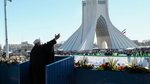 Iranian President Hassan Rouhani salutes the crowd during the commemoration of the 41st anniversary of the Islamic revolution in Tehran - Sputnik International