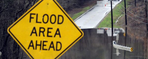 Vehicles turn around on a road blocked by floodwaters in Helena, Ala., on Tuesday, Feb. 11, 2020. The National Weather Service said flooding was expected from central Mississippi to north Georgia following downpours, and severe storms could follow the rain.  - Sputnik International