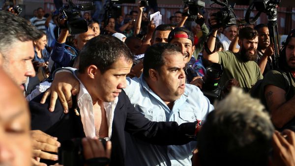 Venezuela's opposition leader Juan Guaido, who many nations have recognized as the country's rightful interim ruler, arrives at the Simon Bolivar international airport in Maiquetia, Venezuela February 11, 2020 Venezuela's opposition leader Juan Guaido, who many nations have recognized as the country's rightful interim ruler, arrives at the Simon Bolivar international airport in Maiquetia, Venezuela February 11, 2020 - Sputnik International