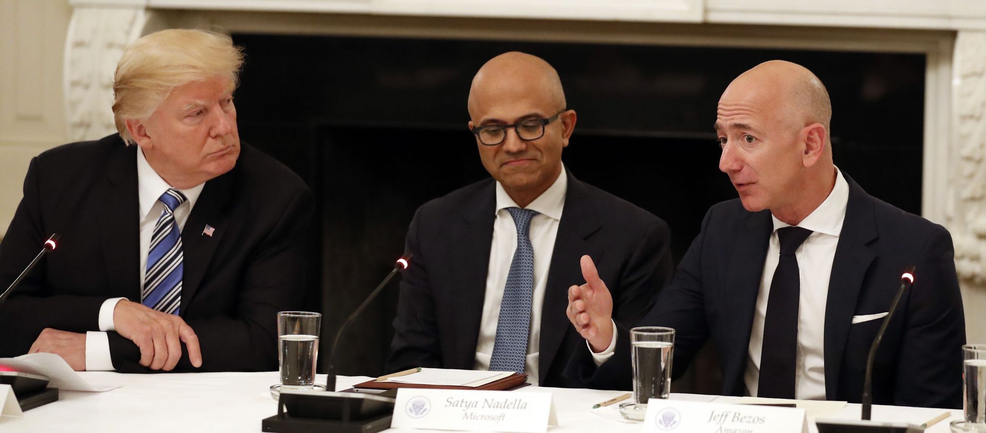 FILE - In this June 19, 2017, file photo, President Donald Trump, from left, and Satya Nadella, Chief Executive Officer of Microsoft, listen as Jeff Bezos, Chief Executive Officer of Amazon, speaks during an American Technology Council roundtable in the State Dinning Room of the White House in Washington FILE - In this June 19, 2017, file photo, President Donald Trump, from left, and Satya Nadella, Chief Executive Officer of Microsoft, listen as Jeff Bezos, Chief Executive Officer of Amazon, speaks during an American Technology Council roundtable in the State Dinning Room of the White House in Washington - Sputnik International, 1920, 15.02.2020